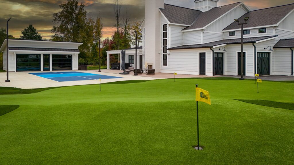 Luxury backyard putting green in Indianapolis with multiple holes and premium synthetic turf by Indy Putting Greens